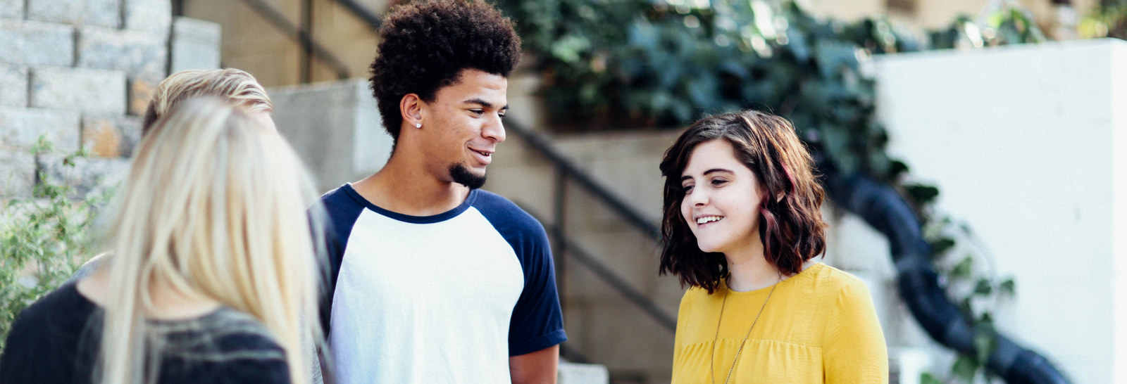A group of 3 students two girls and a boy
